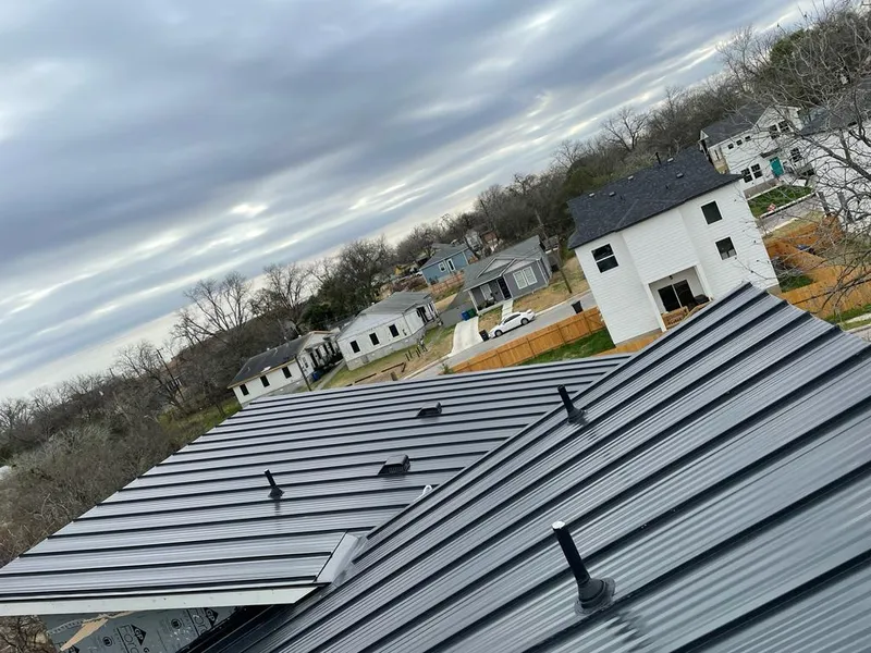 Standing seam metal roof panels with vents for Skylight Repair in Massapequa Park